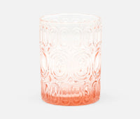 The Aaron Pink Glassware Set of 6 by Blue Pheasant features hand-blown tumblers with a textured, embossed bangle pattern, shown here in a pink tint against a plain white background.