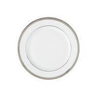 A Bernardaud Athena Platinum Dinnerware plate, crafted from white porcelain with a silver geometric rim, is shown from above against a plain white background.