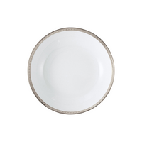 The Bernardaud Athena Platinum Dinnerware plate is round, white porcelain with a metallic silver geometric rim, displayed from above on a plain white background.