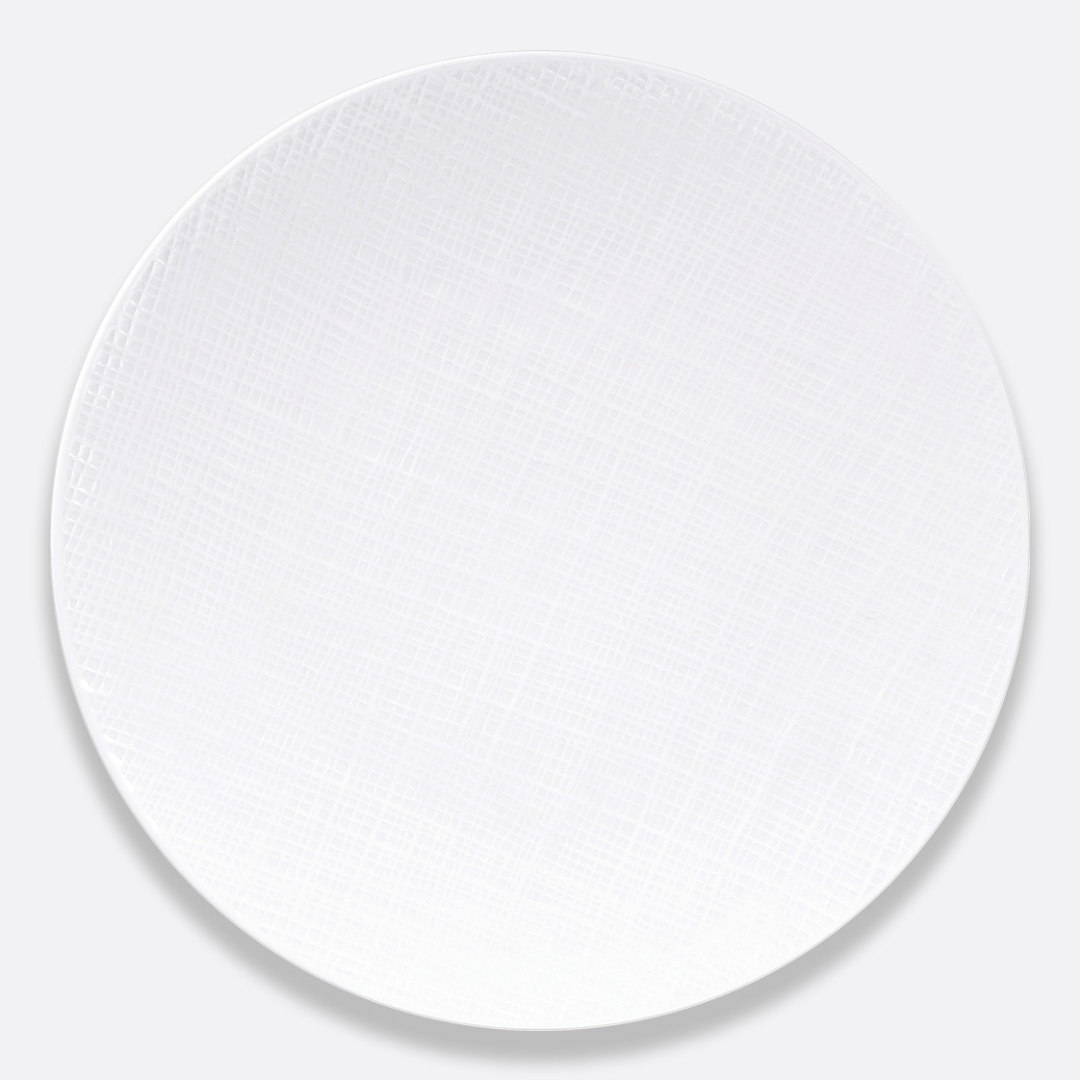 A round, white Bernardaud Organza White Dinnerware plate featuring a subtle textured crisscross pattern, displayed on a plain light gray background.
