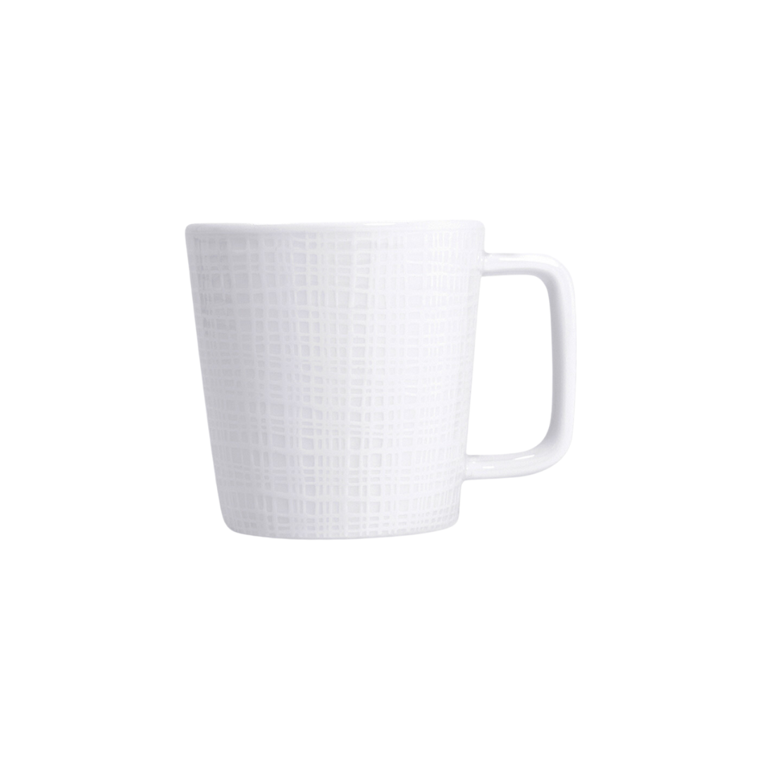 The Bernardaud Organza White Dinnerware mug features a textured crisscross pattern and a simple handle, shown on a white background. Its clean, modern design is ideal for minimalist décor.