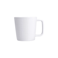 The Bernardaud Organza White Dinnerware mug features a textured crisscross pattern and a simple handle, shown on a white background. Its clean, modern design is ideal for minimalist décor.