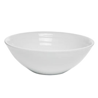 The Bernardaud Origine Dinnerware White bowl features a plain, round design with smooth sides and a wide rim, crafted from fine Limoges porcelain.