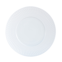 The Bernardaud Twist White Dinnerware plate features a round, white Limoges porcelain design with a geometric textured rim and a smooth, unadorned center, shown from above on a white background.