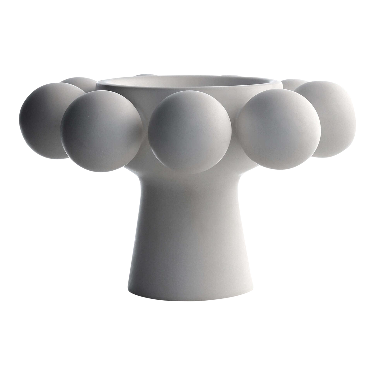 The Nimbus Footed Bowl Alabaster by KleinReid features a modern design with hand-appliquéd porcelain spheres adorning its wide top and round base, all in a sleek alabaster finish.