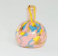 From the Jelly Baby Mini Vase Collection by Maria Ida Designs, this round glass mini vase with a short neck showcases a mosaic pattern in pastel pink, blue, yellow, and white on a light background—embodying the charm of handmade art glass for truly unique home decor.