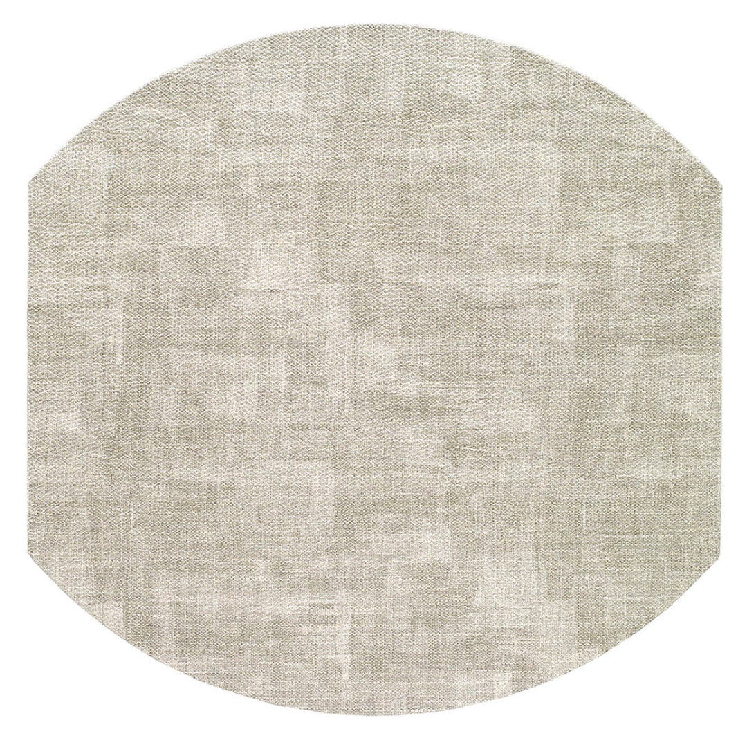 The Bodrum New Luster Elliptic Placemat Set of 4 features round, light beige textured mats with subtle tonal variations and a soft, abstract pattern. Elegant fabric and sturdy construction offer lasting beauty against a white background.