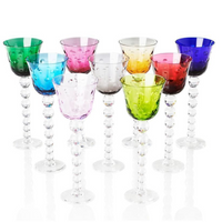 Nine Saint-Louis Bubbles Hock Stemware glasses, featuring textured bubble patterns and clear spherical stems, are arranged in rows on a white background. The set includes vibrant green, blue, pink, red, yellow, and purple colors.
