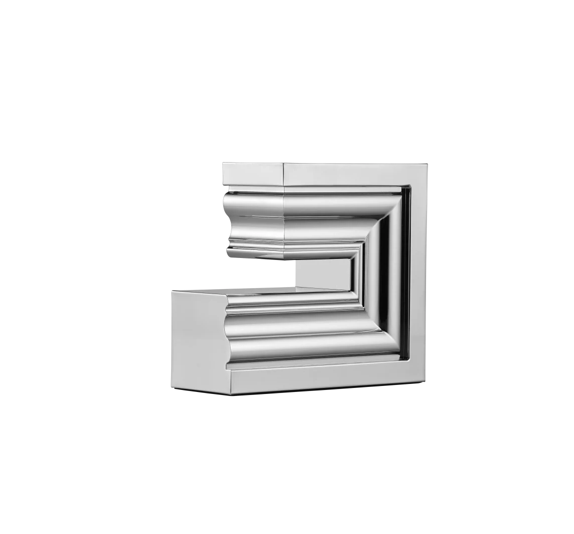 The Perspectives Chrome Candle Holder Large by Christofle features a shiny silver, angular design that serves as a striking modern centerpiece among decorative objects, displayed against a plain white background.
