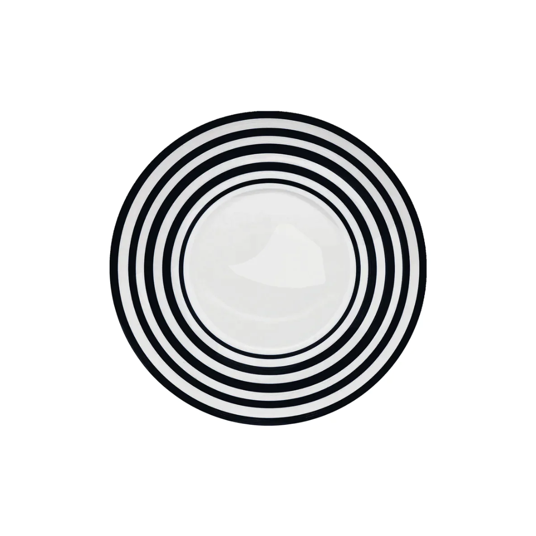 The JL Coquet Hemisphere Bakelite Black Stripes Salad Plate features bold, evenly spaced black stripes forming concentric circles on a round white surface, inspired by Bakélite dinnerware, shown from above on a plain white background.