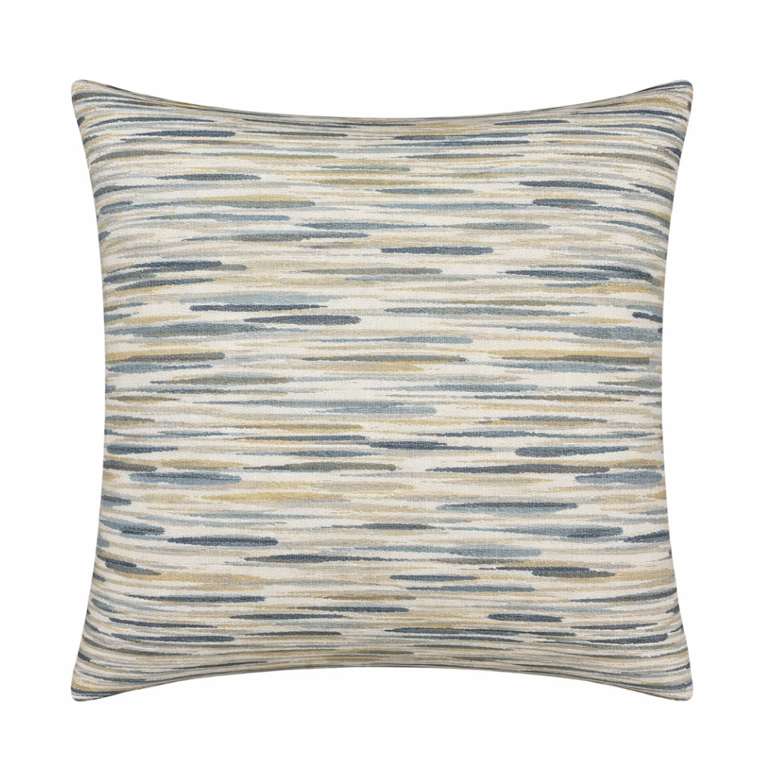 The Calero Pillow Seaglass by Decor Fifty-Five features horizontal brushstroke lines in blue, beige, gray, and cream on a light background, bringing modern abstract style to your space.