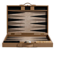 An open Gene Leather Backgammon - Taupe case by Zodax displays the luxurious game board with black and white checkers, dice, and a doubling cube all neatly arranged inside.