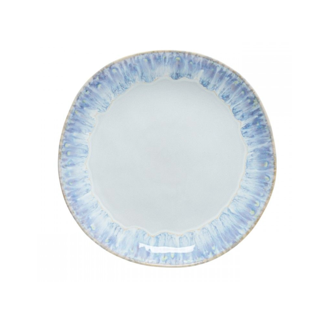 The Costa Nova Brisa Blue Dinnerware plate features a round stoneware design with a light blue and white marbled rim and smooth pale center, crafted in Portugal as part of the Brisa Blue Dinnerware collection.