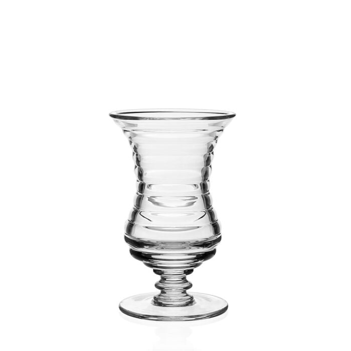 The William Yeoward Ripples Footed Vase, featuring a ribbed glass body, wide flared rim, and sturdy round base, is displayed on a plain white background—ideal for flower arrangements.