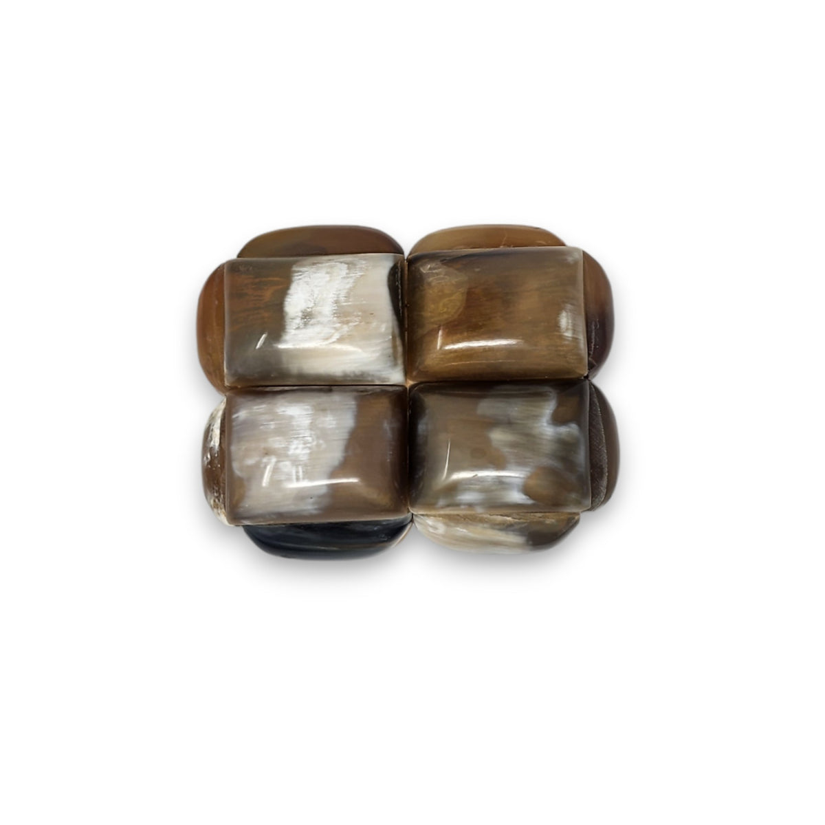 A whimsical decor accent—six polished rectangular stones in brown, cream, and black, arranged in two rows—perfect for display atop the Bubble Horn Box by A Sanoma Inc or any decorative box.