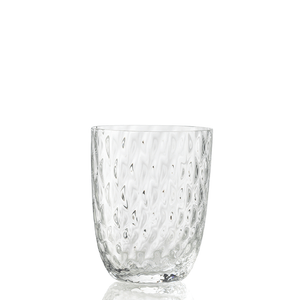The Idra Tumbler Balloton by Nason Moretti is a clear drinking glass featuring a wavy, dimpled texture and is shown upright on a white background.