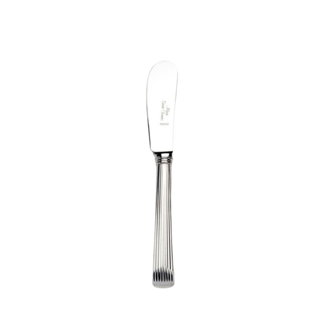 The Beatrix Butter Spreader by Alain Saint-Joanis, made in France, features a stainless steel body with a rounded tip and vertically grooved handle, shown on a plain white background.