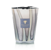 The Baobab Woods Broceliande Candle features a tall marbled glass holder in white, gray, and beige, inspired by Brittany's mystical Brocéliande forest. Finished with a silver and black label and ribbon.
