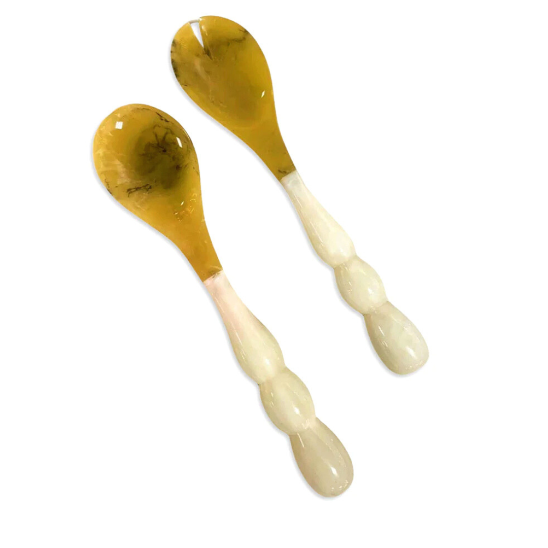 The Beatriz Ball Resin Rio Bubble Salad Servers feature yellow, translucent heads and white bubble handles, arranged parallel on a white background.