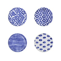 The Vietri Santorini Assorted Cocktail Plates Set of 4 features blue and white floral, geometric diamond, horizontal lines, and polka dot patterns in a 2x2 grid. These round plates are dishwasher safe.