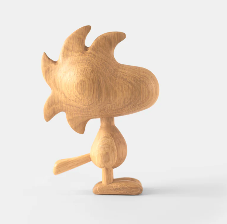 The Boyhood - Ameico Woodstock Statue - Oak - Small is a wooden figurine inspired by the spiky-feathered cartoon bird, photographed on a plain white background.