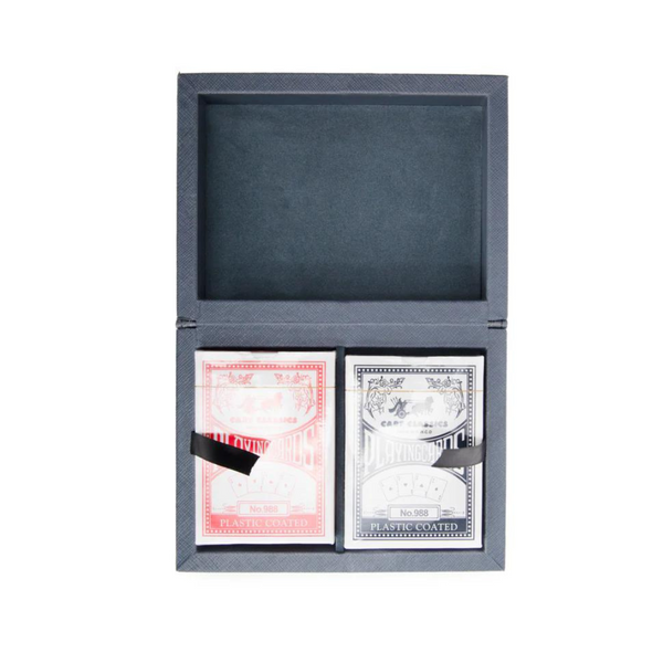 The Rowan Poker Card Set by Brouk & Co includes two decks—one red, one black—secured by a black ribbon, all presented in an open black vegan leather case.