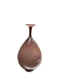 The Trumpet Vase Aubergine by Tyler Barry Design is a glossy, hand-blown piece with a narrow flared neck and wide base in smooth, translucent aubergine—a sophisticated glass decor accent set against a white background.