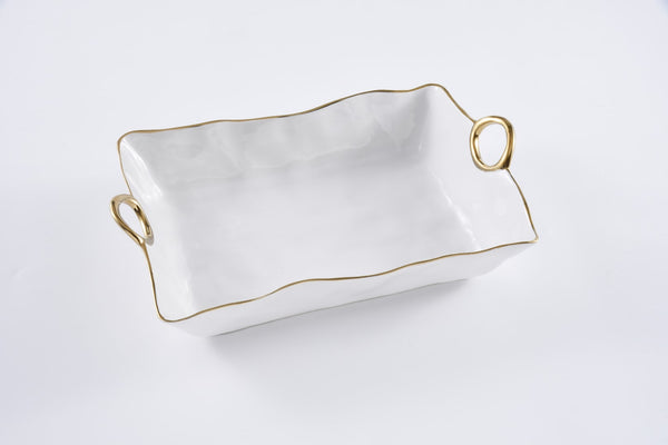 The PAMPA BAY Golden Handle Large Deep Server is a rectangular white ceramic dish with wavy edges, two gold-tone handles, and a thin gold trim along the rim, shown against a plain white background.