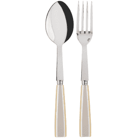 A Sabre Icone Serving Set, including a stainless steel spoon and fork with beige handles, is arranged side by side on a plain, light background.