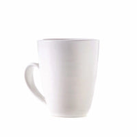 The Simon Pearce Barre Dinnerware Alabaster mug is a white ceramic mug with a handle, made in the USA and displayed against a white background.
