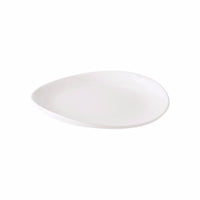 The Simon Pearce Barre Dinnerware Alabaster is a white, asymmetrical ceramic plate with a smooth curved edge, expertly crafted in the USA and shown on a plain white background as part of a modern dinnerware set.