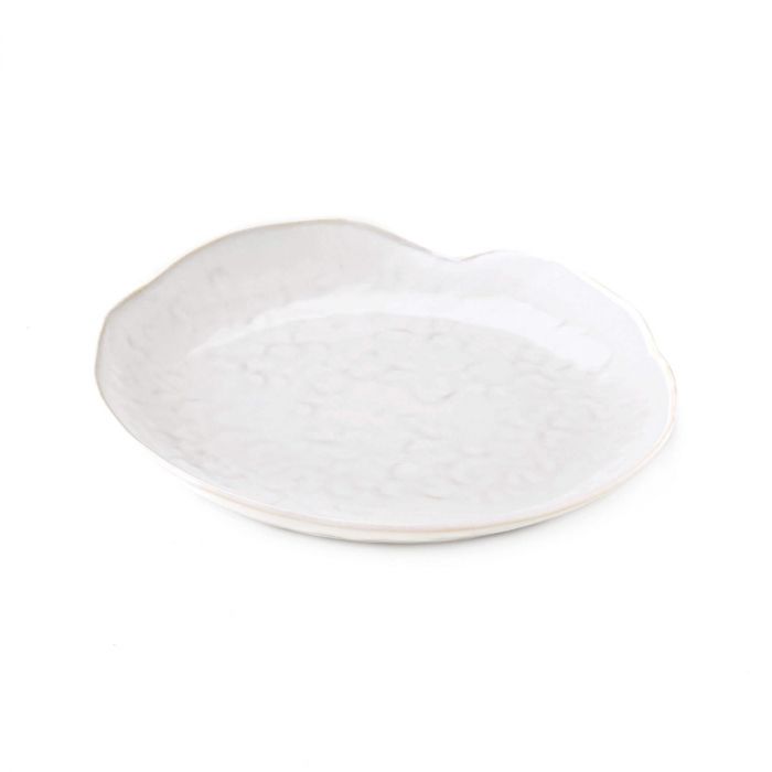 The Simon Pearce Burlington Dinnerware Cloud is a white, slightly oval plate with organic, gently wavy edges and a subtle textured pattern, shown against a plain white background.