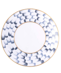 The Marie Daâge Zephyr 1 Dinnerware by Marie Daâge is a round white porcelain plate featuring a wide rim with hand-painted black brushstroke-like marks and two thin gold bands on the rim and inner edge.