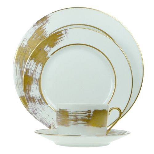 Elevate your table setting with the Shanghai Dessert Salad Plate in Gold by Poc A Poc. Made from fine Limoges porcelain, this elegant white salad plate features hand-painted gold brushstroke accents and delicate gold trim, delivering a sophisticated and modern look—ideal for those seeking timeless, handcrafted dinnerware artistry.