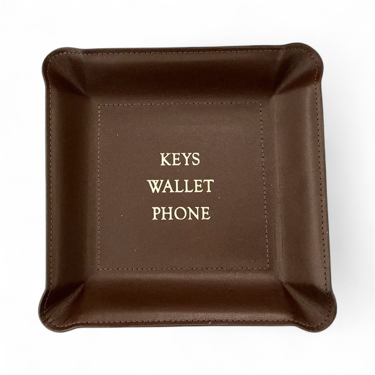 The Graphic Image Leather Valet Tray - Keys Wallet Phone - is a square brown leather catchall with "KEYS WALLET PHONE" in white at the center, featuring stitched raised edges and shown on a white background.