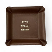 The Graphic Image Leather Valet Tray - Keys Wallet Phone - is a square brown leather catchall with "KEYS WALLET PHONE" in white at the center, featuring stitched raised edges and shown on a white background.