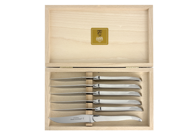Set of six Claude Dozorme Inox Brillant Steak Knives| Shiny Stainless, Set of 6 stainless steel steak knives arranged in a wooden storage box.