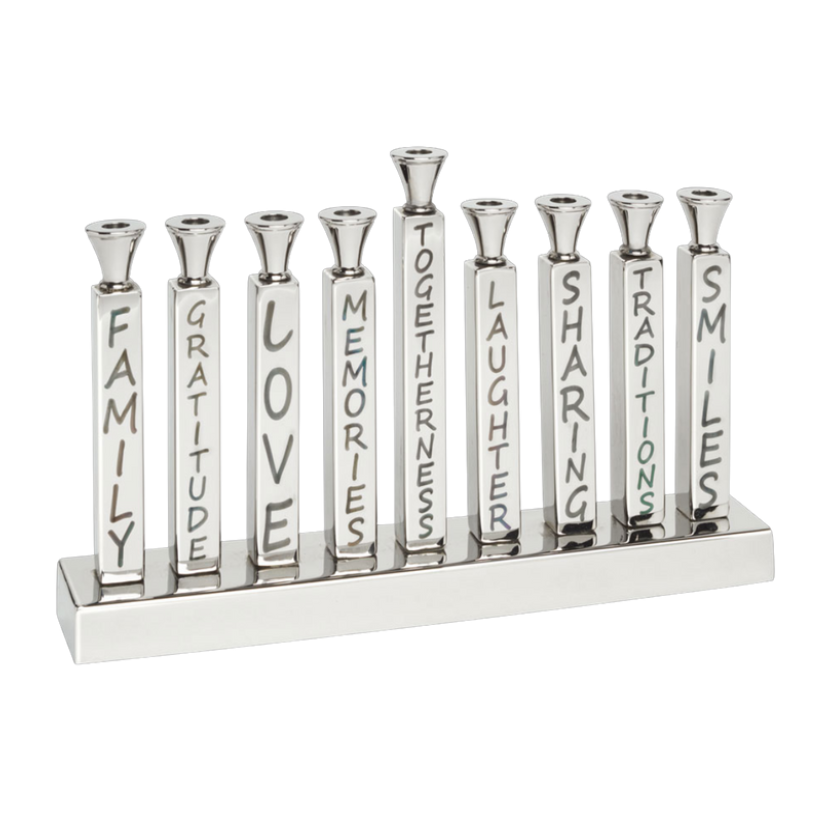 The Mimi Menorah by Inspired Generations is a silver menorah featuring aluminum candle holders, each labeled with words such as Family, Gratitude, Love, Memories, Togetherness, Laughter, Sharing, Traditions, and Smiles—making it a meaningful choice for Hanukkah gifts.