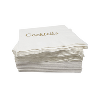 The Cocktails Napkin Pack - White & Gold by Print Appeal features elegant gold foil napkins with "Cocktails" in gold lettering on the top, displayed on a plain white background.