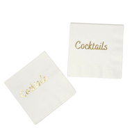 The Cocktails Napkin Pack - White & Gold by Print Appeal features chic white napkins with "Cocktails" in elegant gold foil—one angled, one upright—perfect for your next celebration.