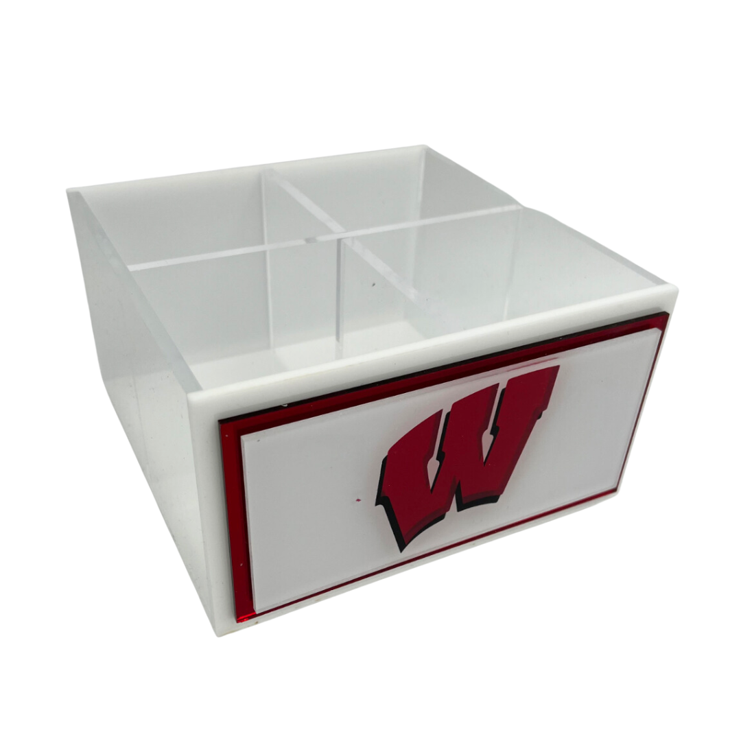 The Eye Candy College Spinner is a white plastic desk organizer with four compartments and a front panel showing the University of Wisconsin's red W logo outlined in black and red.
