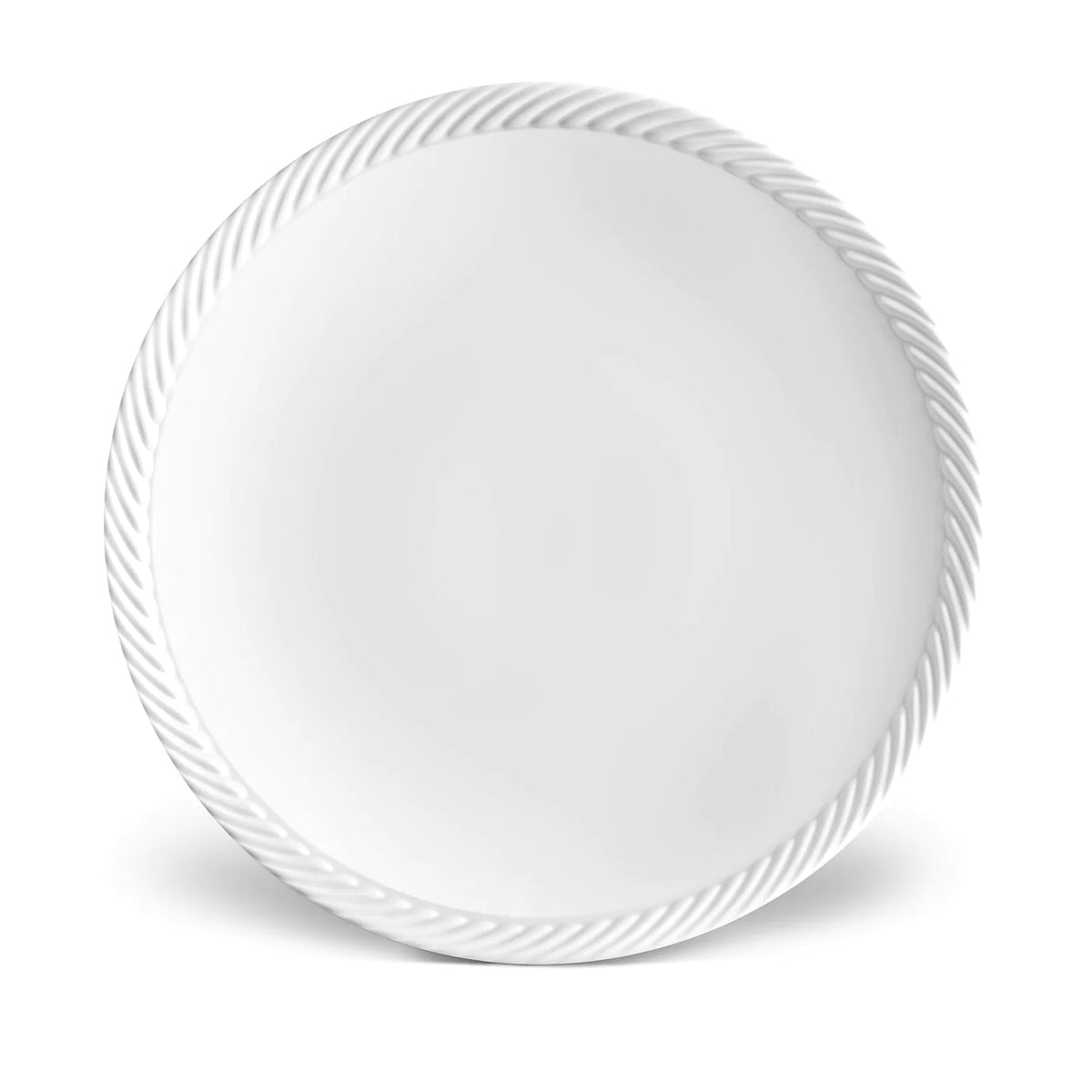 The Corde White Dinner Plate by L'Objet features a braided rim and is crafted from fine porcelain, shown on a white background.