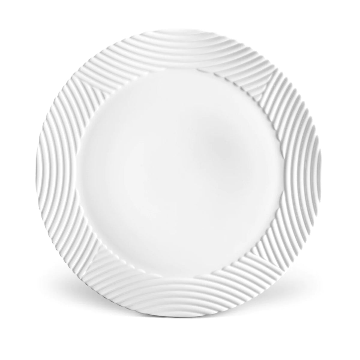 The Corde White Dinnerware soup plate by L'Objet features fine white porcelain with a textured rim of repeating waves and a smooth center, creating an elegant and timeless design.