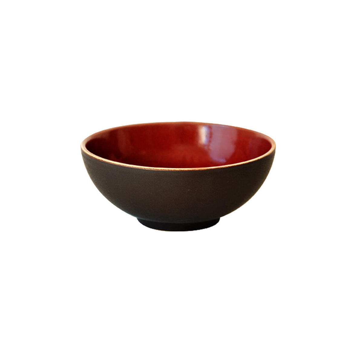 The Tourron Dinnerware Cerise by Jars - Rosenthal is a round ceramic bowl with a matte black exterior and glossy deep red interior, featuring beautiful glazes, displayed on a white background.