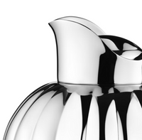 Close-up of the Bernadotte New Thermo Jug w/Push Stopper - Coffee & Tea by Georg Jensen, featuring elegant Scandinavian design with a curved spout and ribbed body, set against a white background.