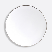 The Bernardaud Cristal Coupe Dinnerware features a plain, round white ceramic plate with a thin platinum rim, shown from above on a light gray background.