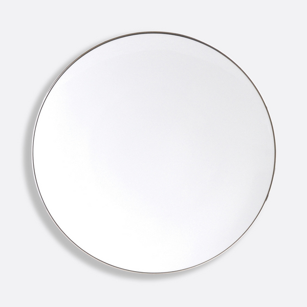 The Bernardaud Cristal Coupe Dinnerware features a plain, round white ceramic plate with a thin platinum rim, shown from above on a light gray background.