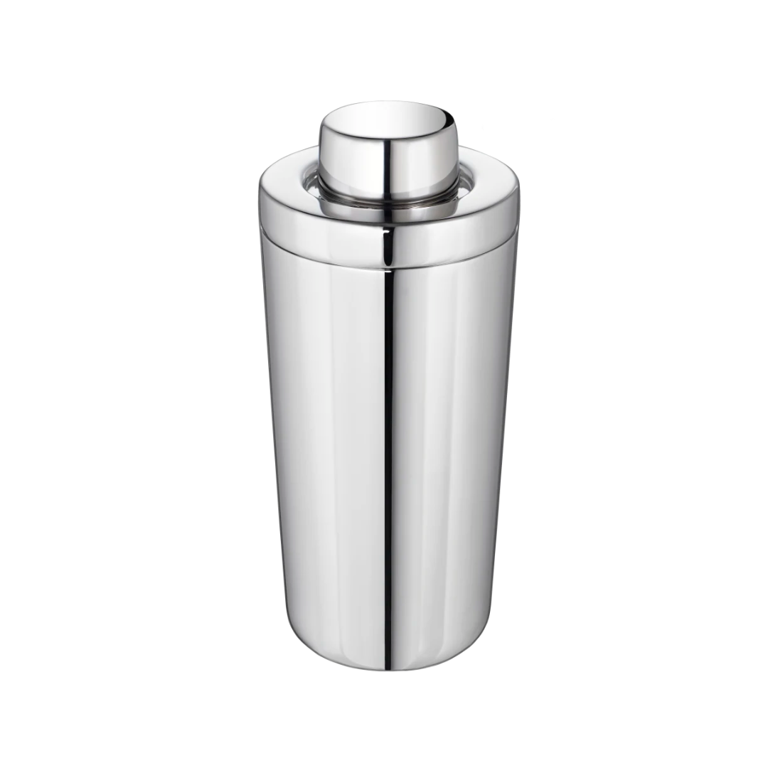 The Christofle Oh De Stainless Steel Shaker features a sleek, shiny finish and a rounded, detachable lid, making it an elegant drink mixer. It is shown against a plain white background.