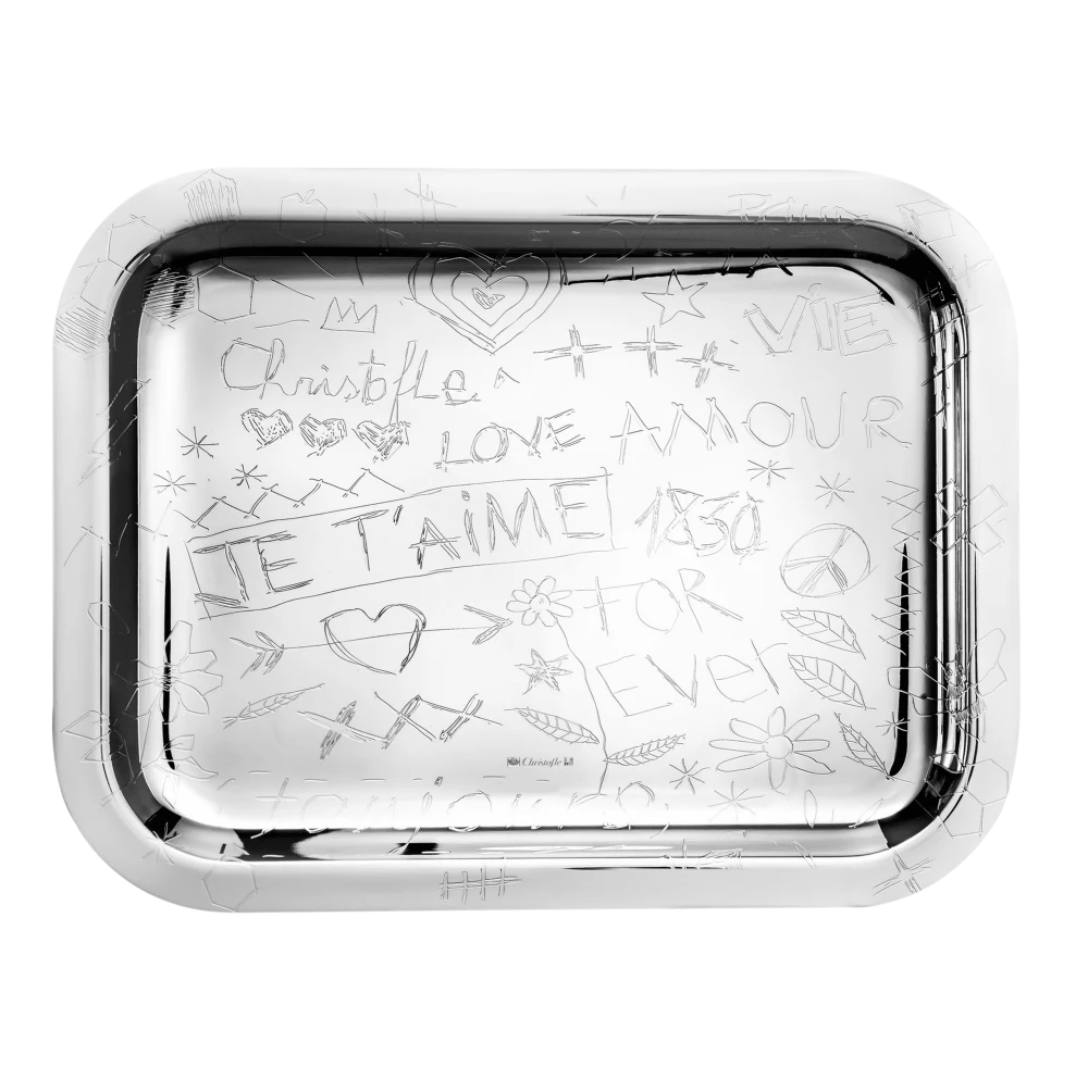 The Christofle LOVE Graffiti silver plated tray features etched doodles, hearts, flowers, and "JE TAIME FOREVER," reflecting La Tete Au Cube’s playful pop art serving tray style.