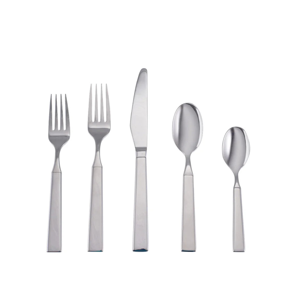 The Simon Pearce Woodstock 5 Piece Setting includes two forks, one knife, one tablespoon, and one teaspoon with square handles, shown upright on a white background in this elegant stainless steel flatware set.